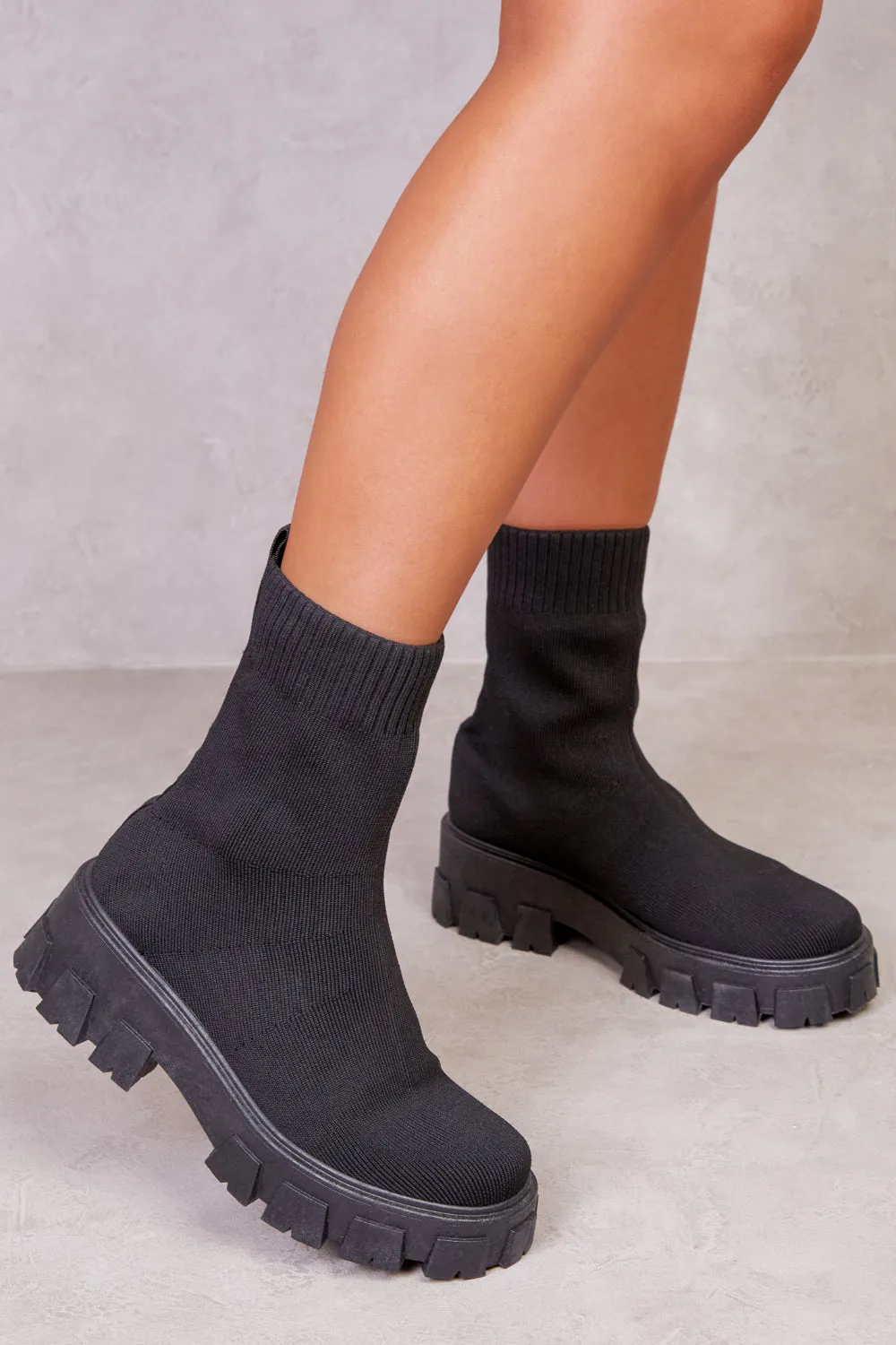 CHELSEA CHUNKY BOOT WITH KNITTED SOCK IN BLACK