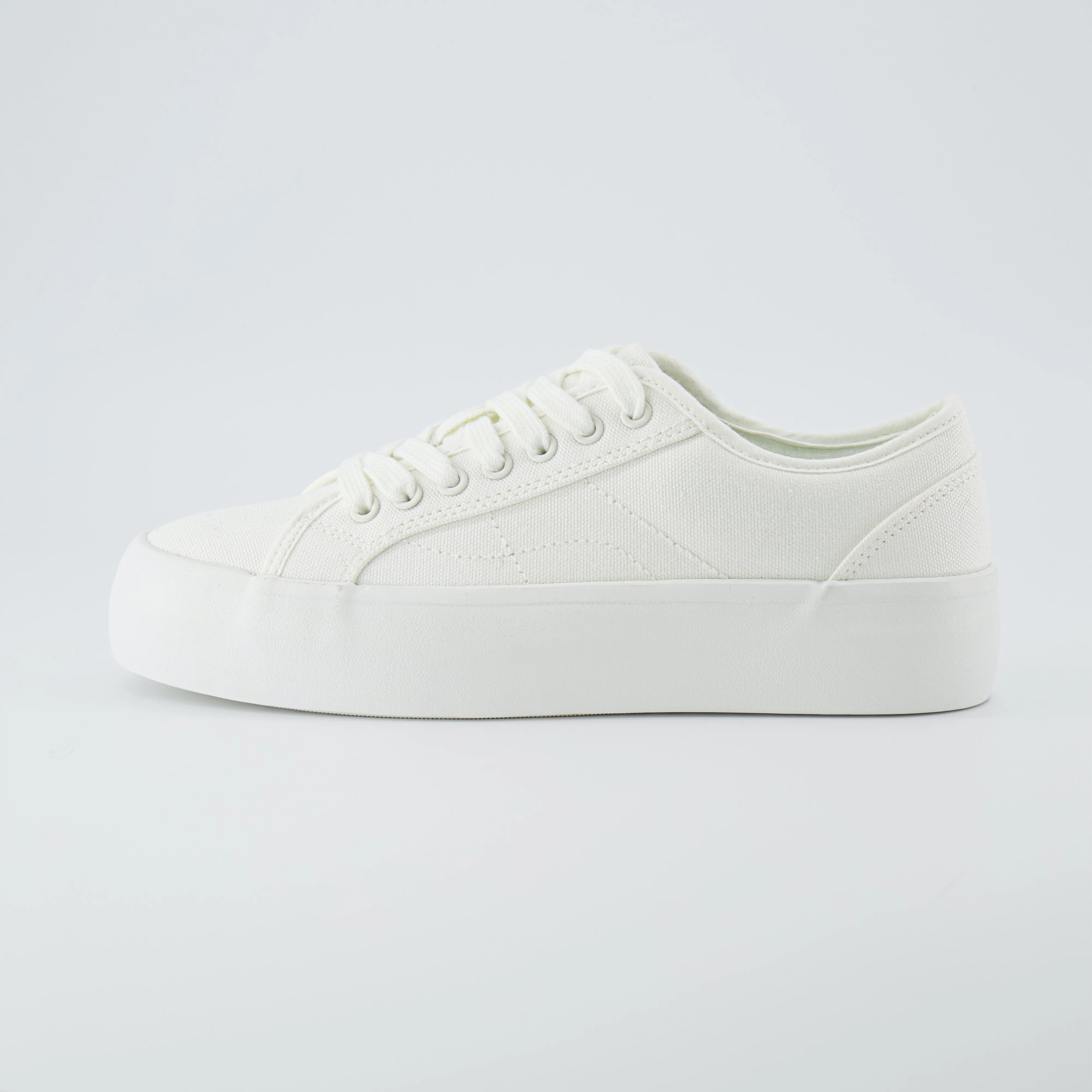 Tag Low Top Canvas Sneaker