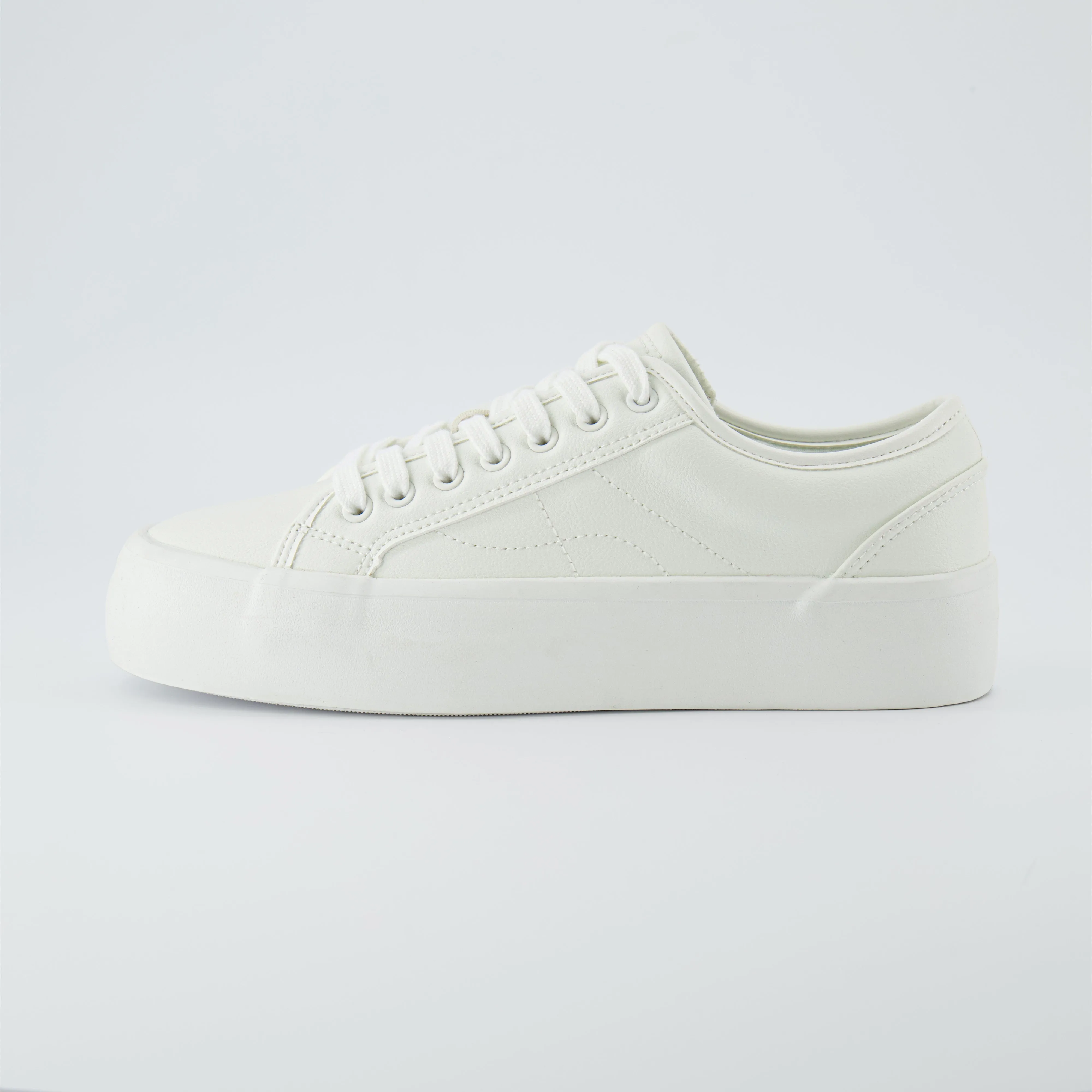 Tag Low Top Canvas Sneaker