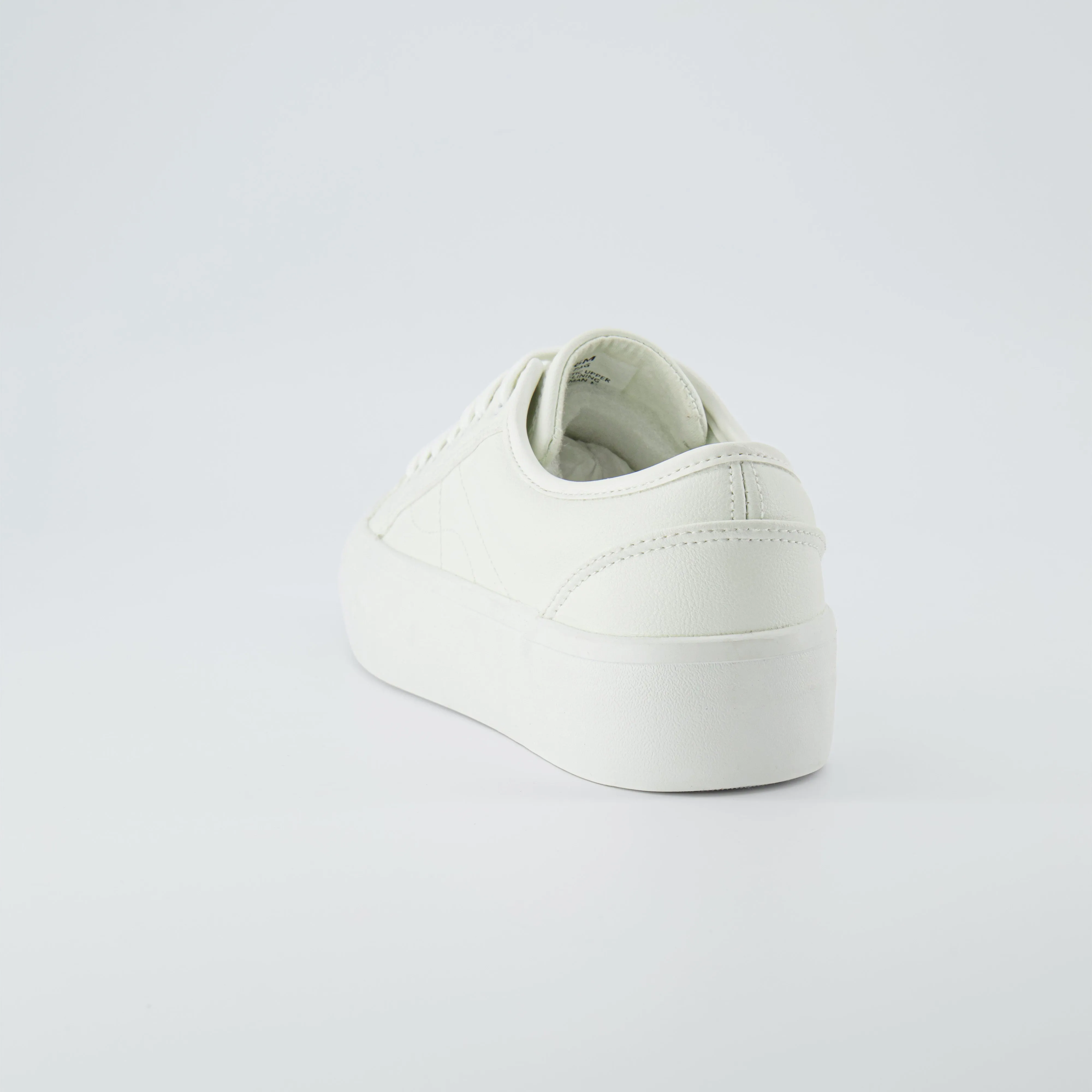 Tag Low Top Canvas Sneaker