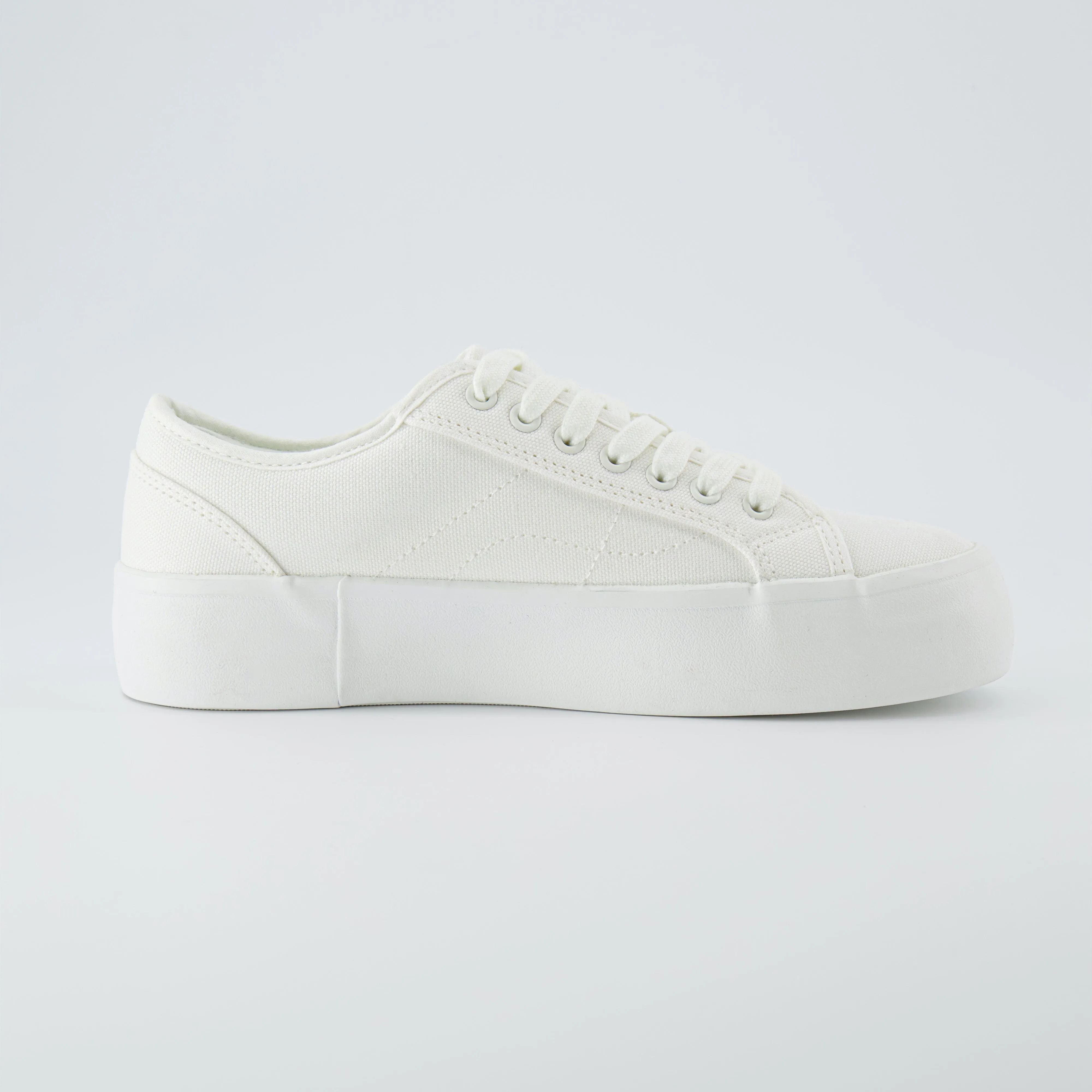 Tag Low Top Canvas Sneaker