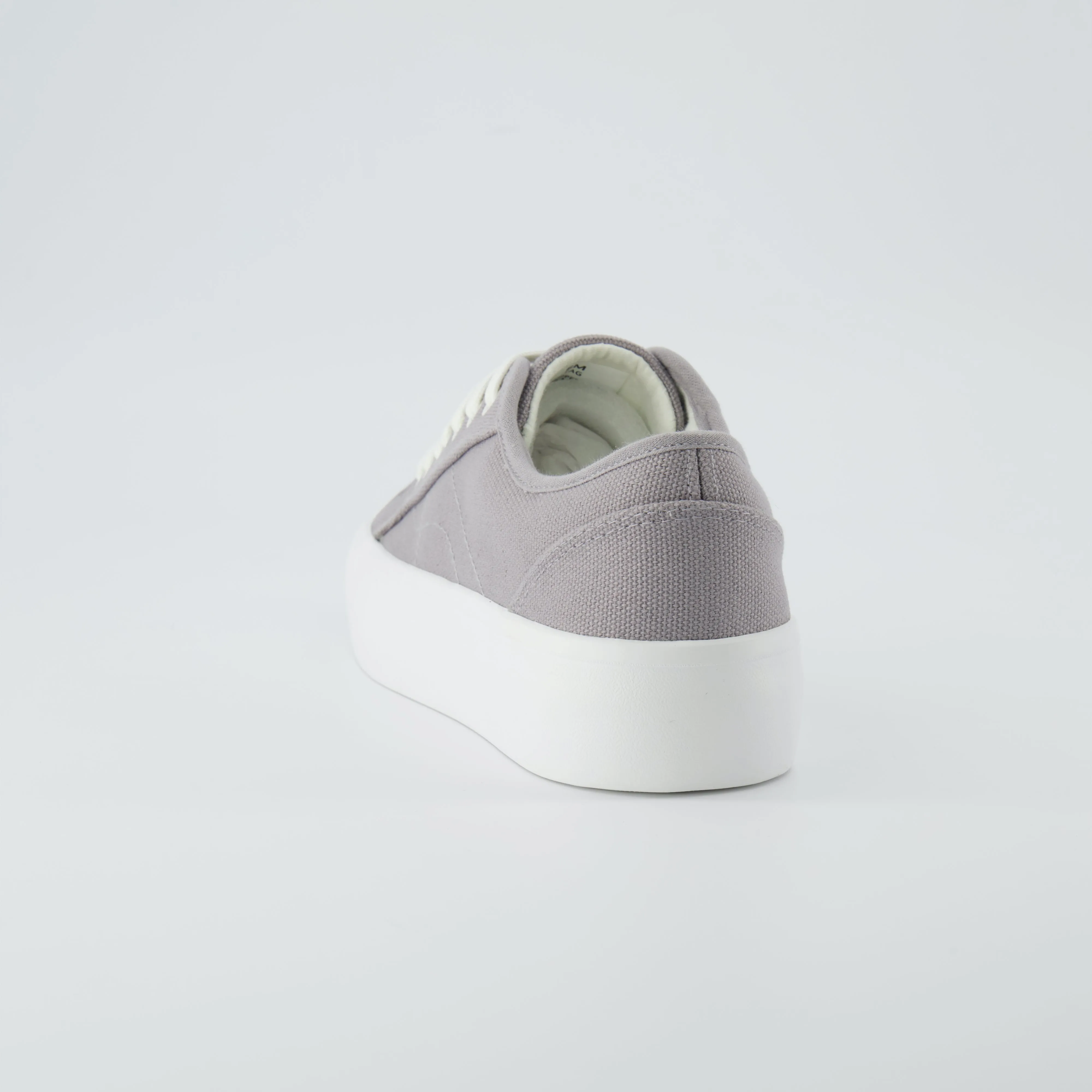 Tag Low Top Canvas Sneaker