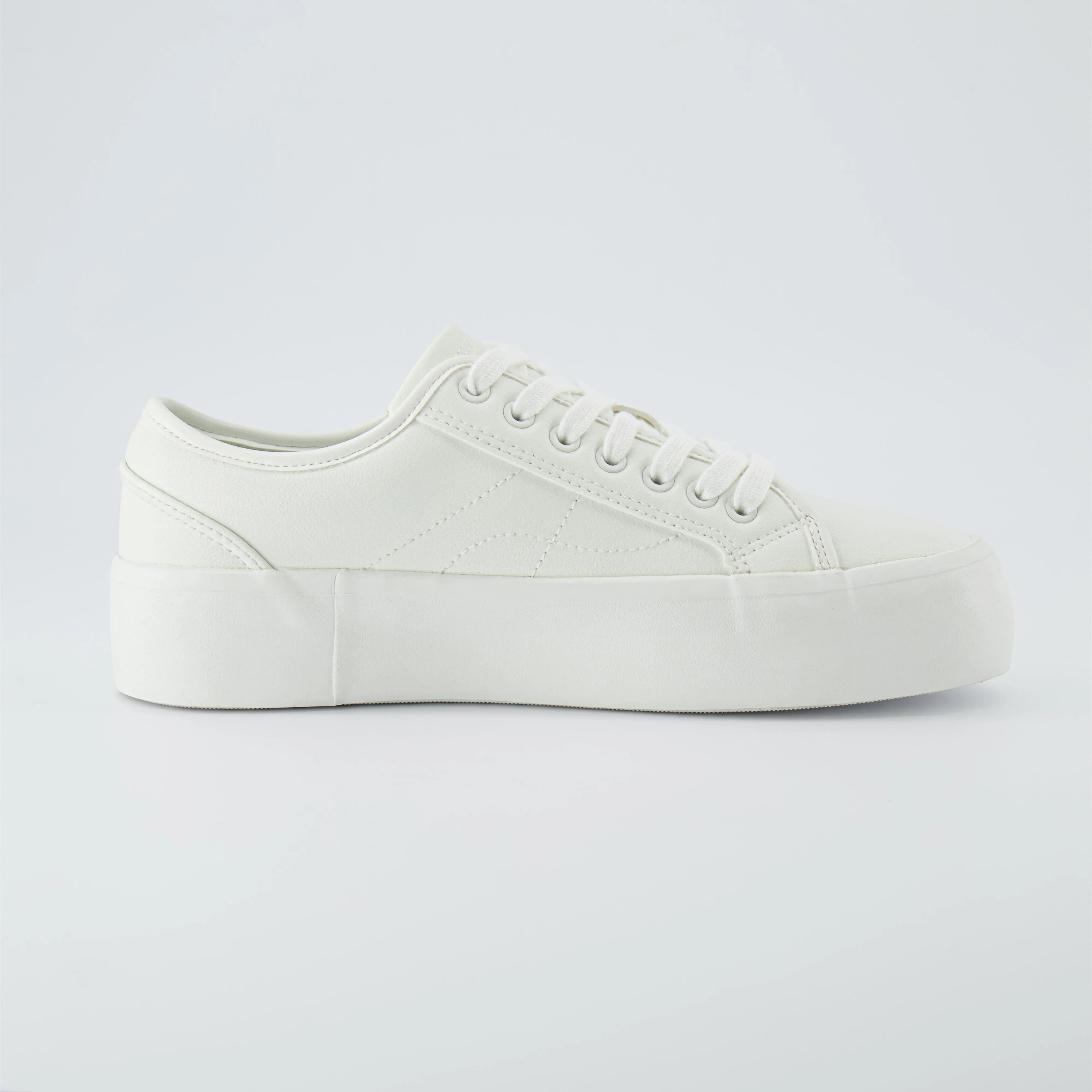 Tag Low Top Canvas Sneaker